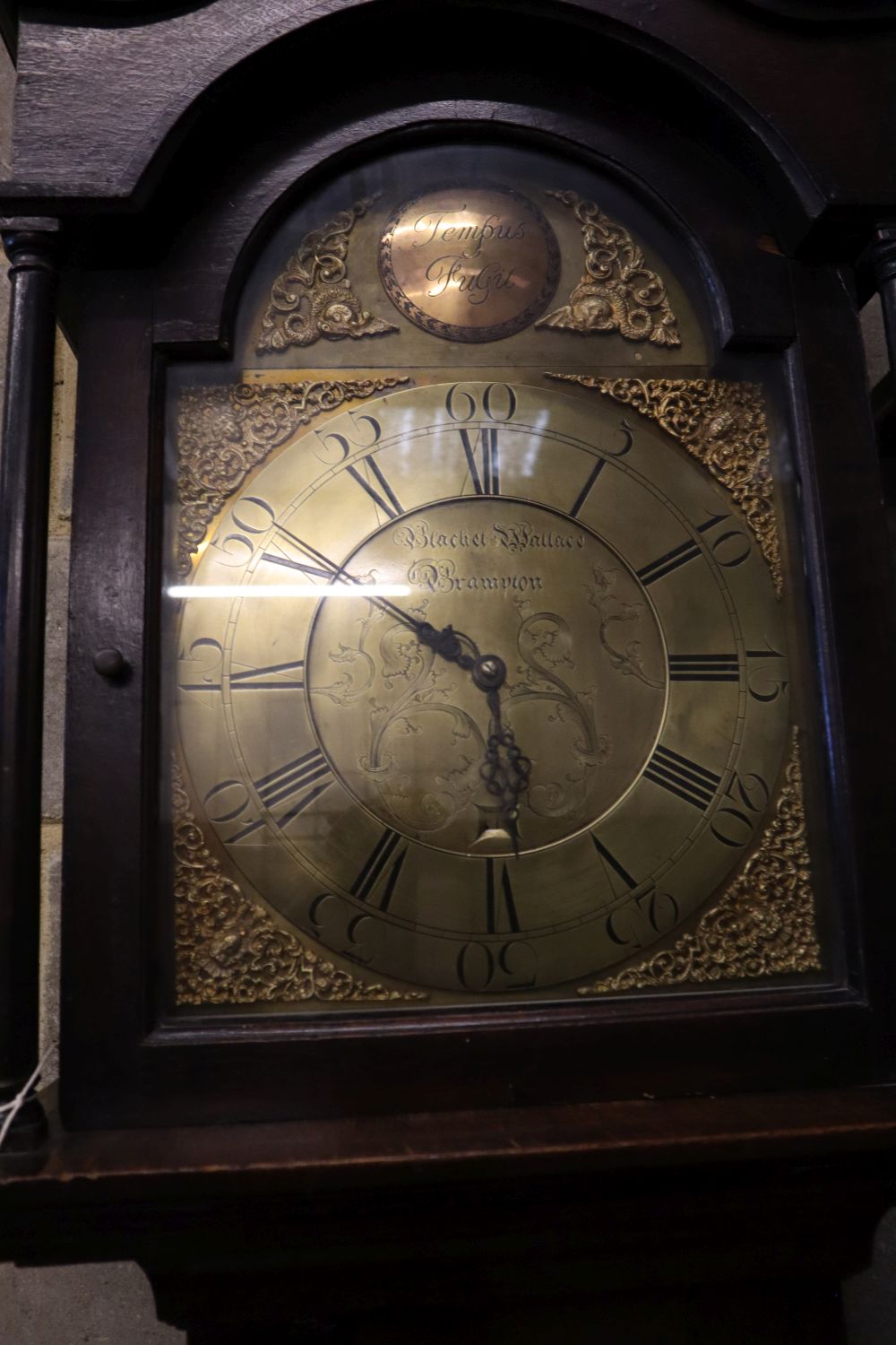 A George III oak thirty hour longcase clock, marked Wallace, Brampton, height 240cm